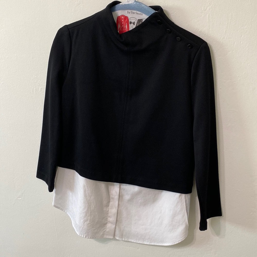 Theory top with button neck and zipper back. Size M